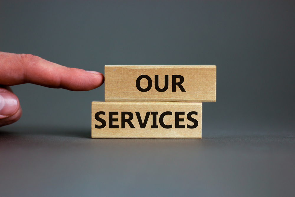 wooden,blocks,with,the,text,'our,services',on,beautiful,grey